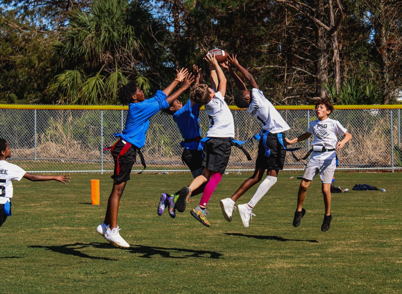 kids playing touch football